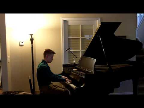 Stefan, student of Dr. Janice Saffir, performing on grand piano